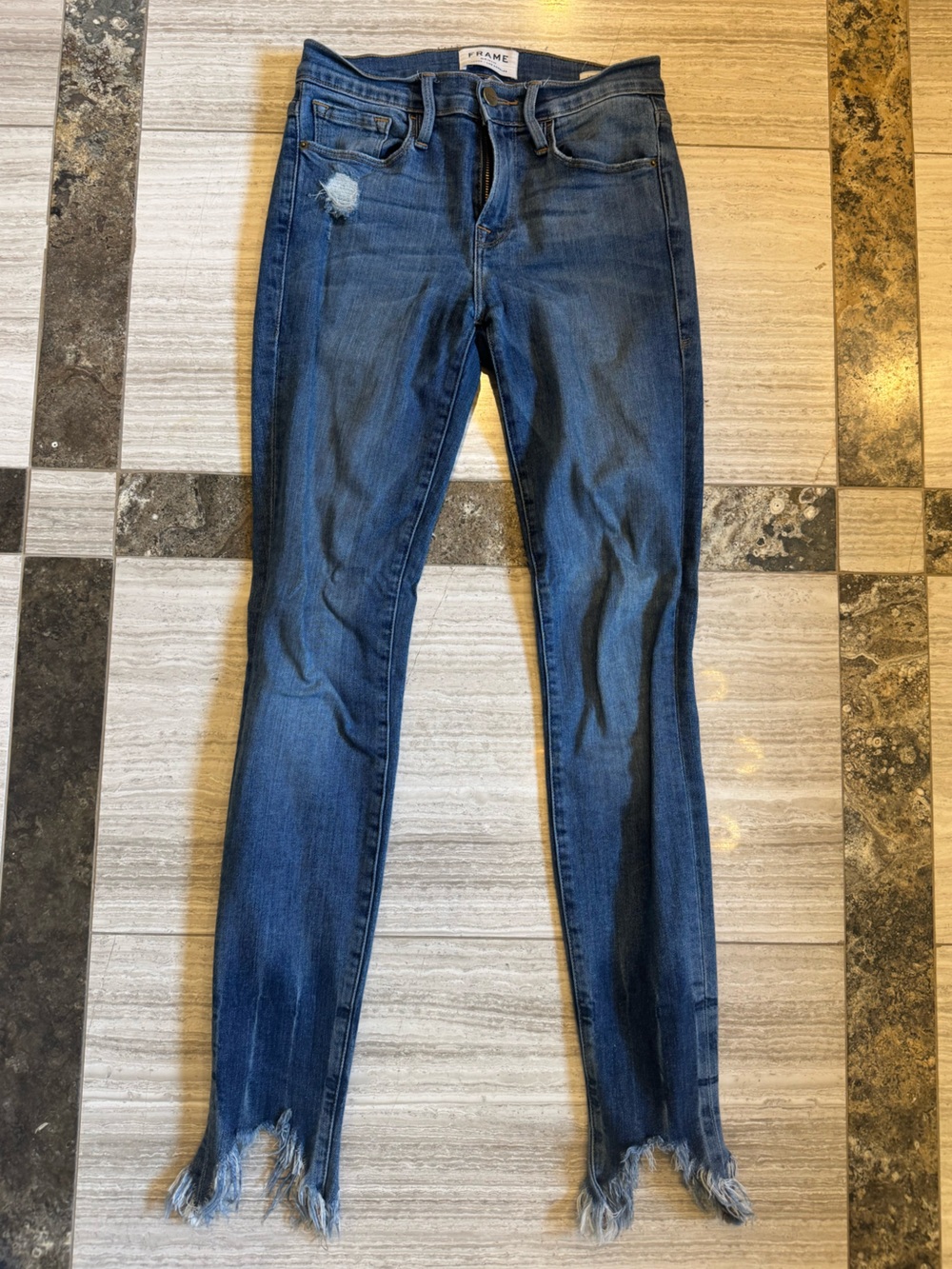 Frame Denim Women's Skinny Jeans in Dark Blue with Frayed Hem